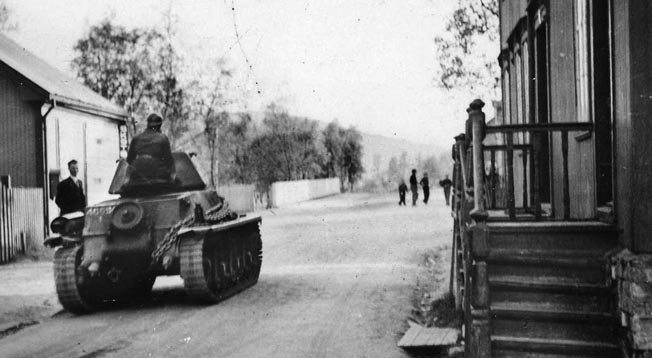 A French Hotchkiss H39 light tank rolls through the nearly empty streets of Narvik, which was taken from the Germans on May 28.