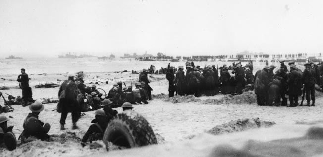Looking like a scene from the Dunkirk evacuation, British troops take up positions on a Norwegian beach and prepare to defend against a possible German assault, May 1940. By May 25 Allied commanders received the order to evacuate from Norway.