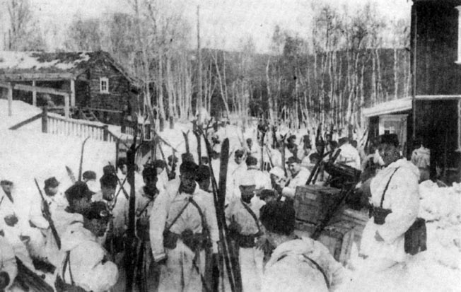 Company 6, 11th Norwegian Infantry Regiment shoulders its skis and prepares to advance toward invading German airborne troops near Dombås.